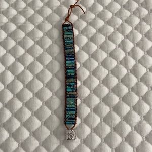 Bracelet 14” turquoise, leather band.